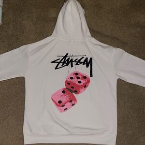 Stussy white hoodie, Men’s Medium with pink dice on back.